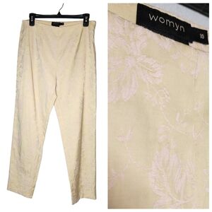 Womyn yellow pink floral pants. Tapered leg. Women's size 10. Back slit